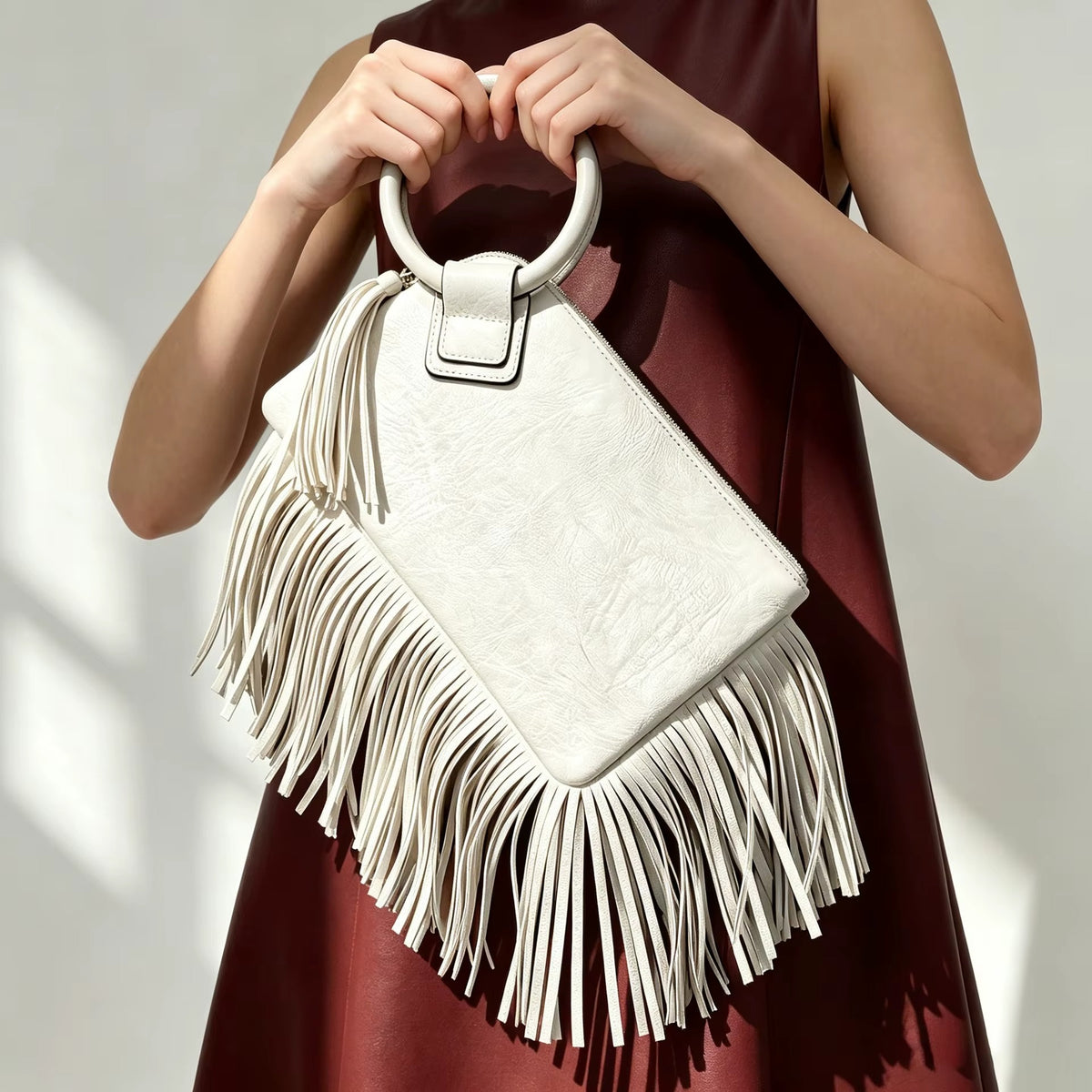 Camille Fringe Clutch